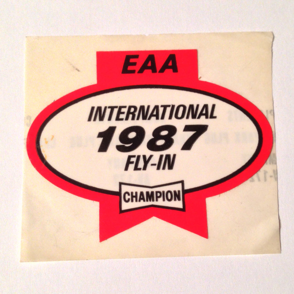 Original EAA Oshkosh 1987 Decal.  Never used 2.75" Plastic Champion Spark Plug issue.