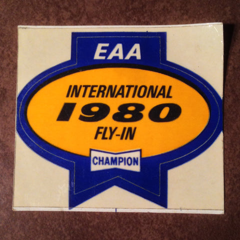 Original EAA Oshkosh 1980 Decal.  Never used 2.75" Plastic Champion Spark Plug issue.
